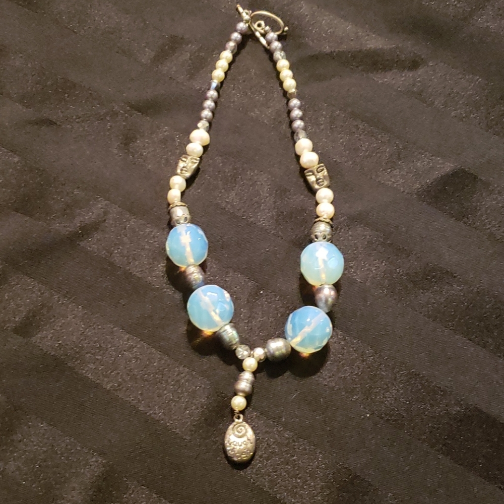 Handmade necklace. Measures at 16 inches.